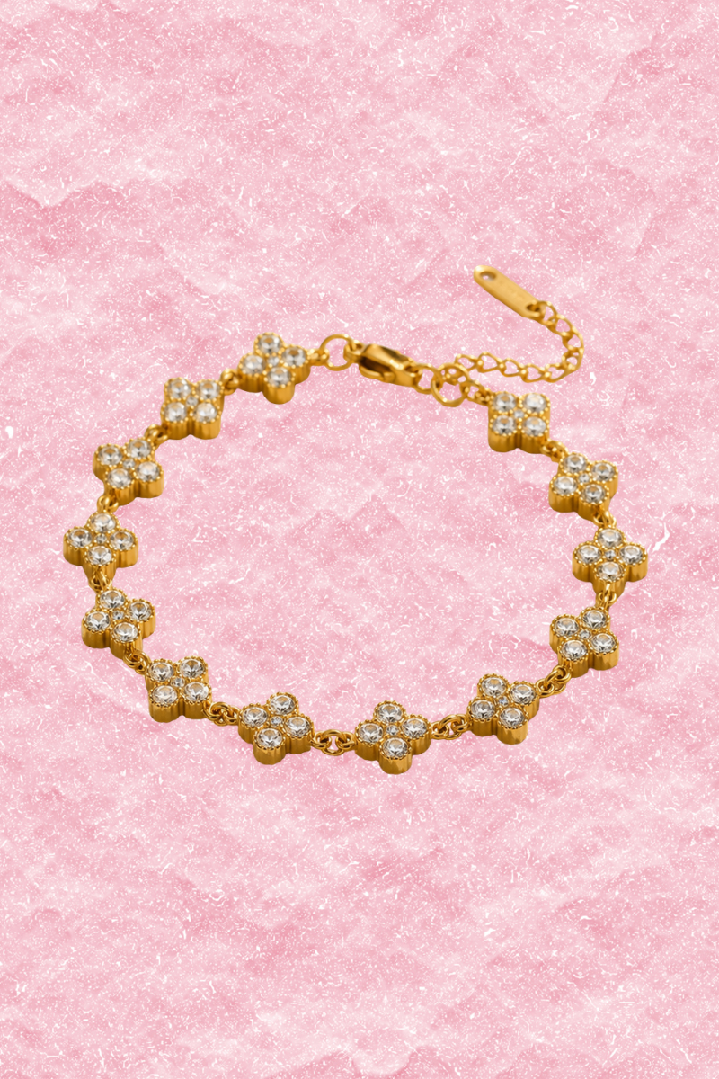 Gouden Flower armband van Fencyjewels met meerdere kleine bloemen en een verstelbare sluiting.