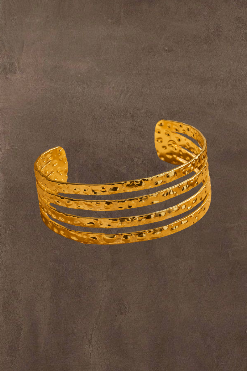 Gouden verstelbare Golden hour bangle van Fencyjewels met meerdere banen en verfijnde details.