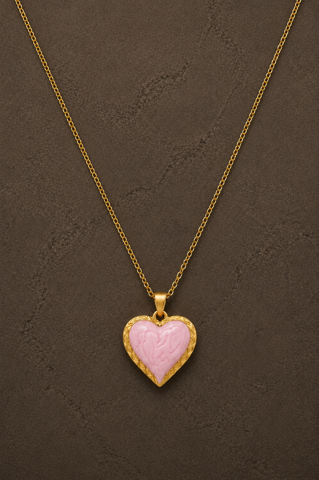 Gouden Livia heart ketting van Fencyjewels met een lichtroze hartvormige hanger.