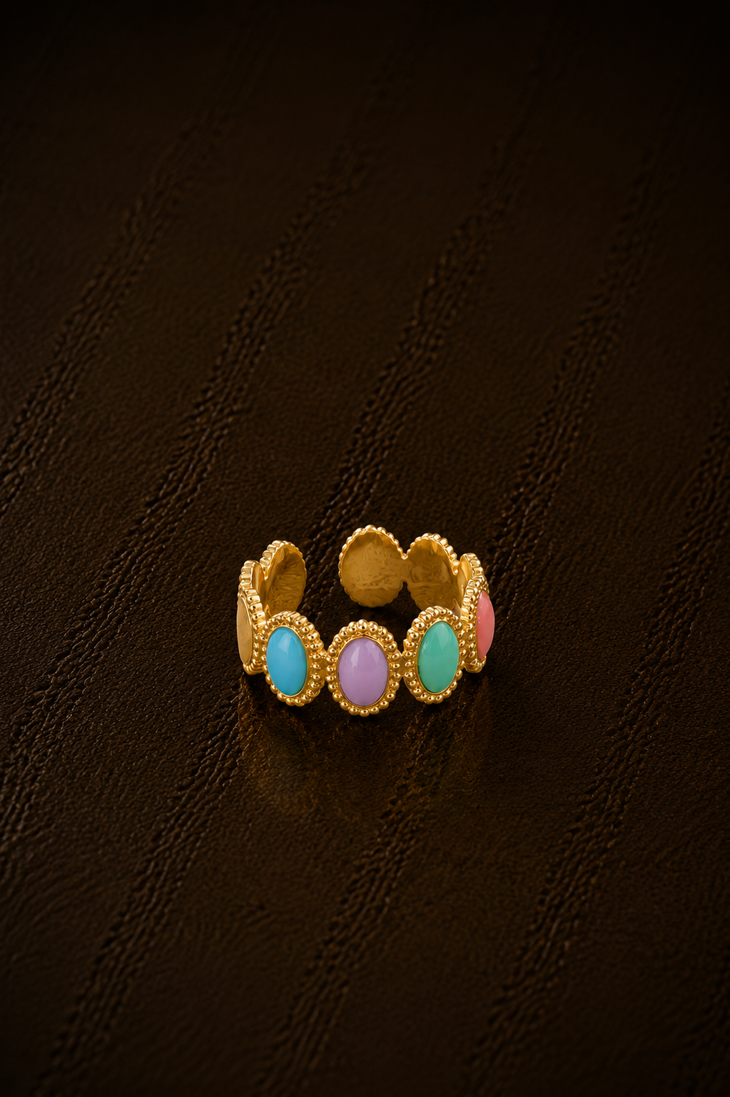 Gouden verstelbare Sorbet ring van Fencyjewels met multicolor details in roze, blauw, groen en pasteltinten.