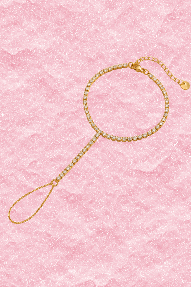 Gouden Sparkle handchain van Fencyjewels met een subtiel en elegant kettinkje voor hand en vinger.
