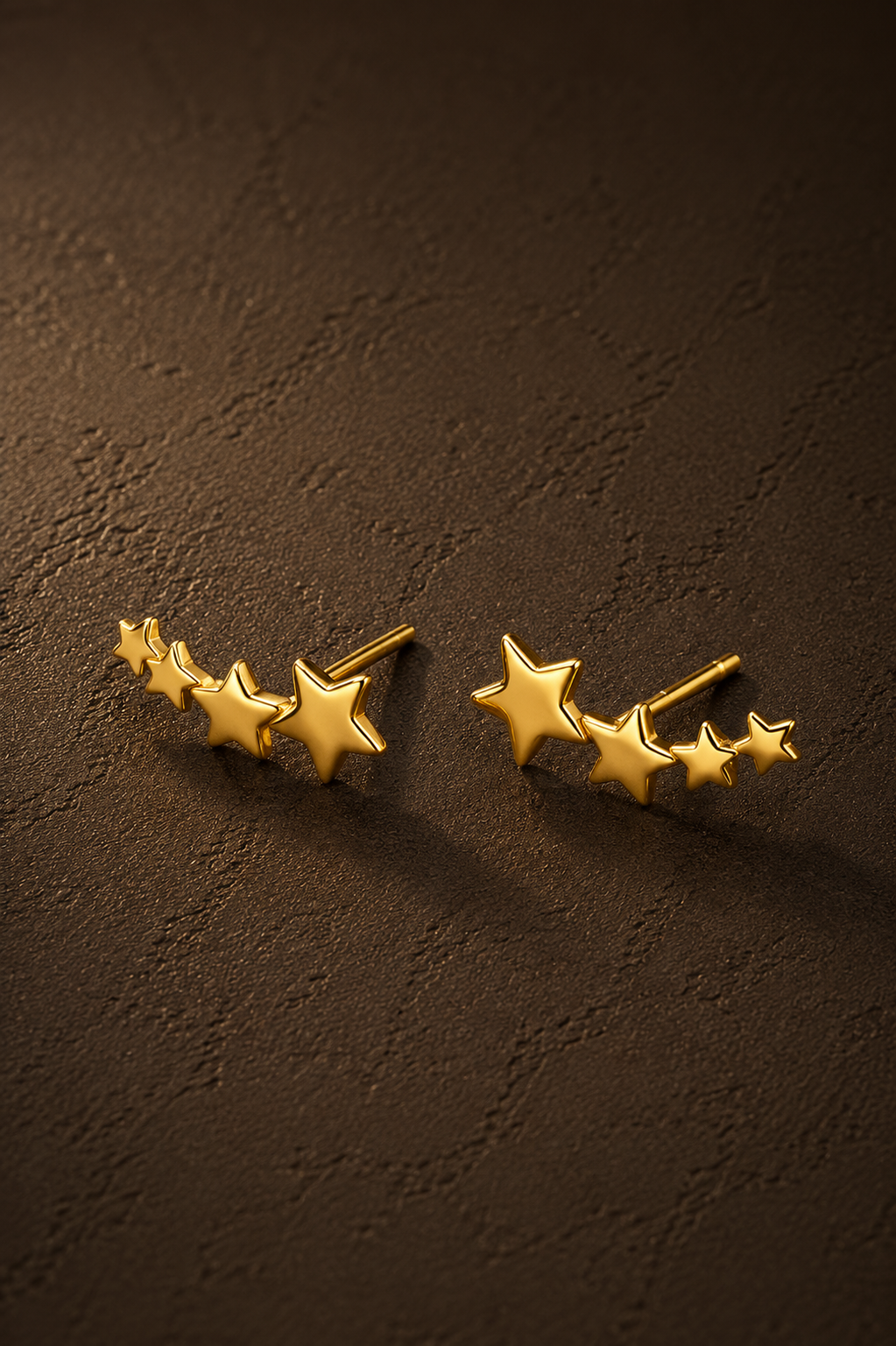 Gouden Starlight oorbellen van Fencyjewels met een speels design van meerdere kleine sterren.