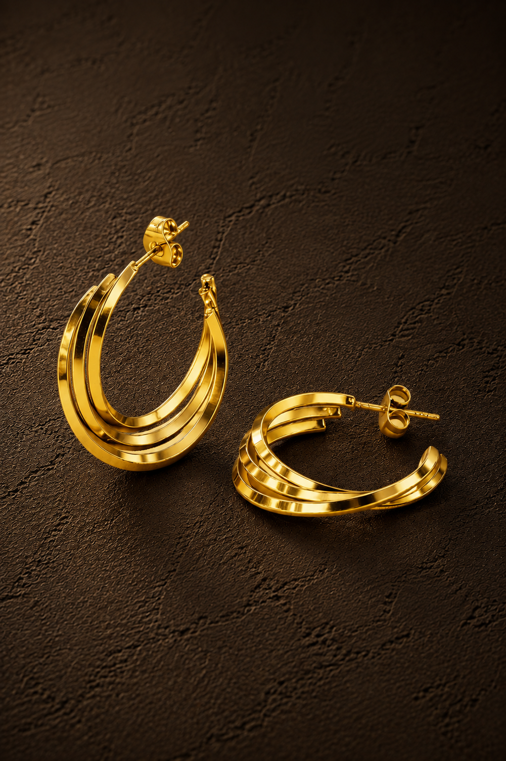 Gouden Twist hoops van Fencyjewels met een opvallende gedraaide structuur en glanzende afwerking.