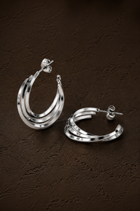 Zilveren Twist hoops van Fencyjewels met een opvallende gedraaide structuur en glanzende afwerking.
