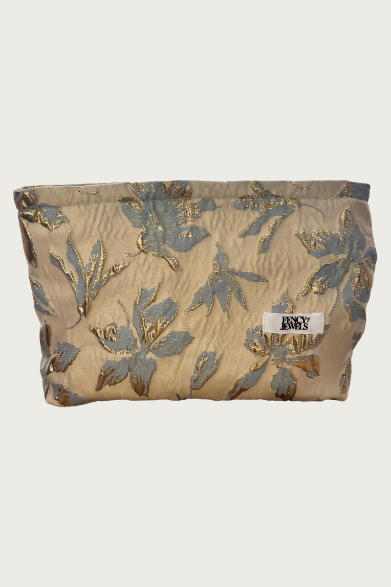 Fency Toilettas van Fencyjewels met gouden bloemenprint en lichtblauwe details, ideaal om sieraden of make-up in te bewaren, een stijlvol en elegant accessoire voor dagelijks gebruik.