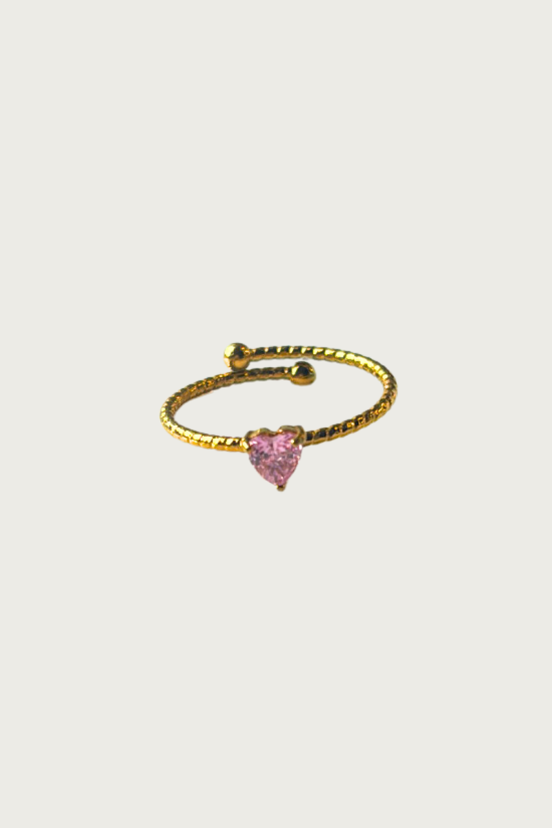 Gouden ring met roze hartje van Fencyjewels – verstelbare ring met roze steentje in hartvorm, elegante en romantische sieradenstijl.