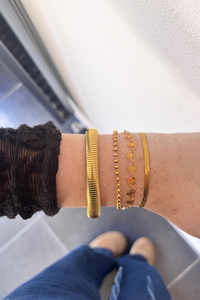 Fencyjewels gouden armbanden – stijlvolle combinatie van gold plated armbanden met hartjes, kralen en slangmotief. Luxe en elegante damesarmbanden, perfect voor elke gelegenheid.