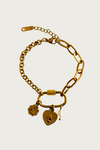 Fencyjewels gouden schakelarmband met bedels. Luxe damesarmband met hart, klavertjevier en parelbedel – stijlvolle gold plated armband van Fencyjewels.
