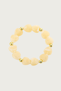 Hartjes armband geel met hartvormige kralen van stainless steel van Fencyjewels, flexibel stretchdesign en waterproof.