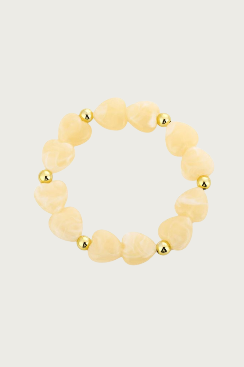 Hartjes armband geel met hartvormige kralen van stainless steel van Fencyjewels, flexibel stretchdesign en waterproof.