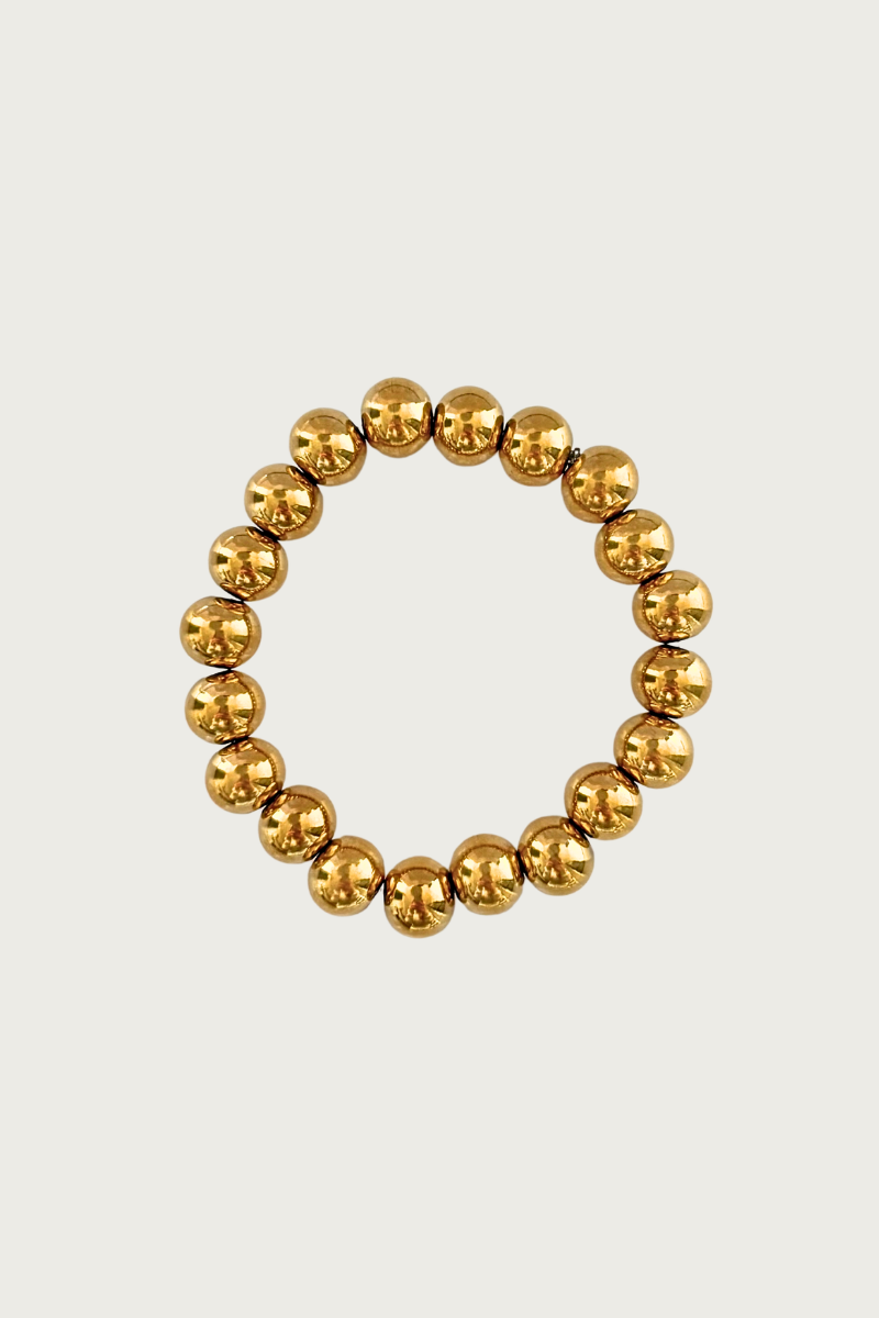 Stretch balls armband 10mm van Fencyjewels met ronde bolletjes in goudkleur. Elastische armband van stainless steel, waterproof en perfect voor een trendy en tijdloze look.